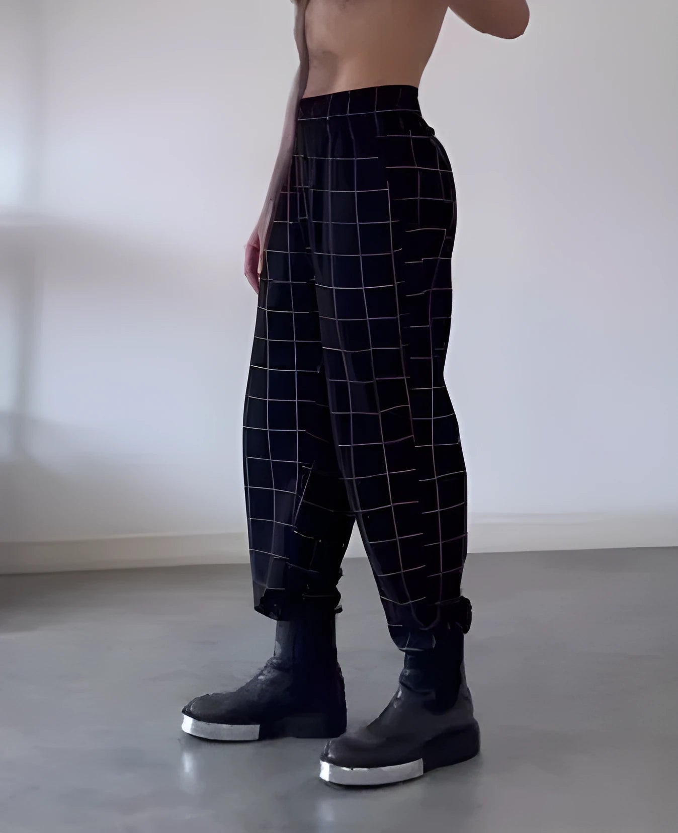 Men's plaid trousers with apron detailing in cotton polyester blend fabric