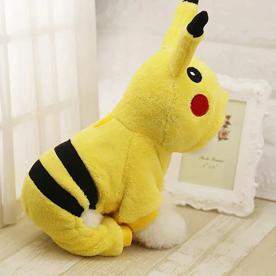 A small dog or cat wearing a soft fleece hoodie coat in a cosplay style.
