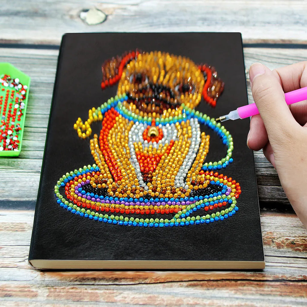 Black A5 DIY diamond painting notebook open showing pages for glitter artwork