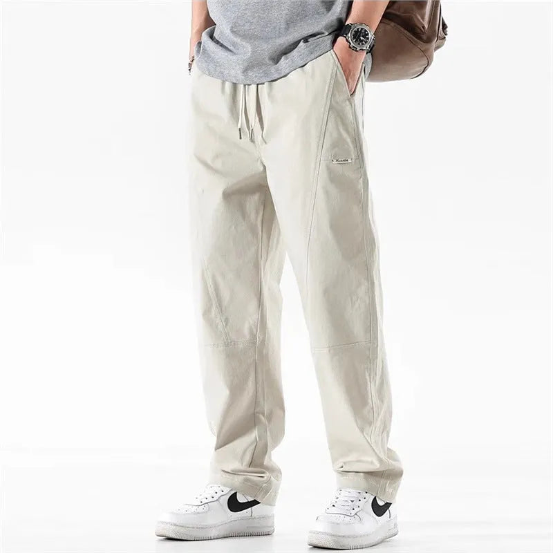 Casual wide-leg cotton trousers in milky white colour showing pants-mouth style