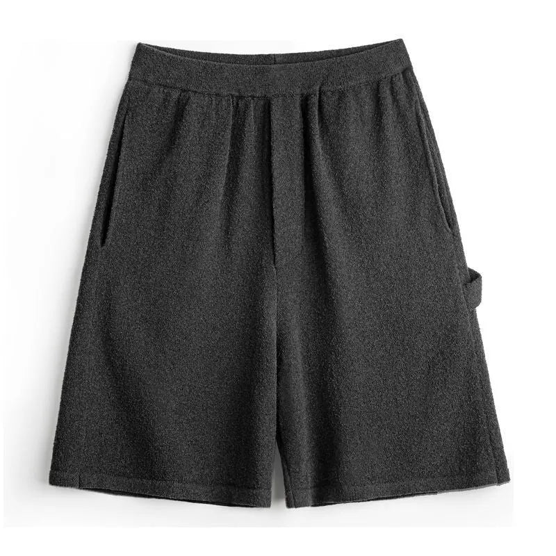 Cement grey loose fit sports shorts with straight leg cut and elastic waistband