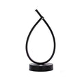 Black and white water drop shaped USB bedside table lamp measuring 30cm tall
