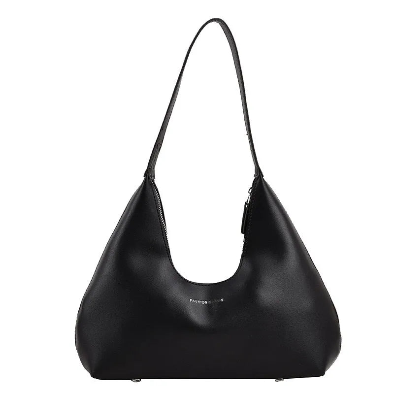 Women's retro style PU shoulder handbag in pillow shape with organised interior compartments