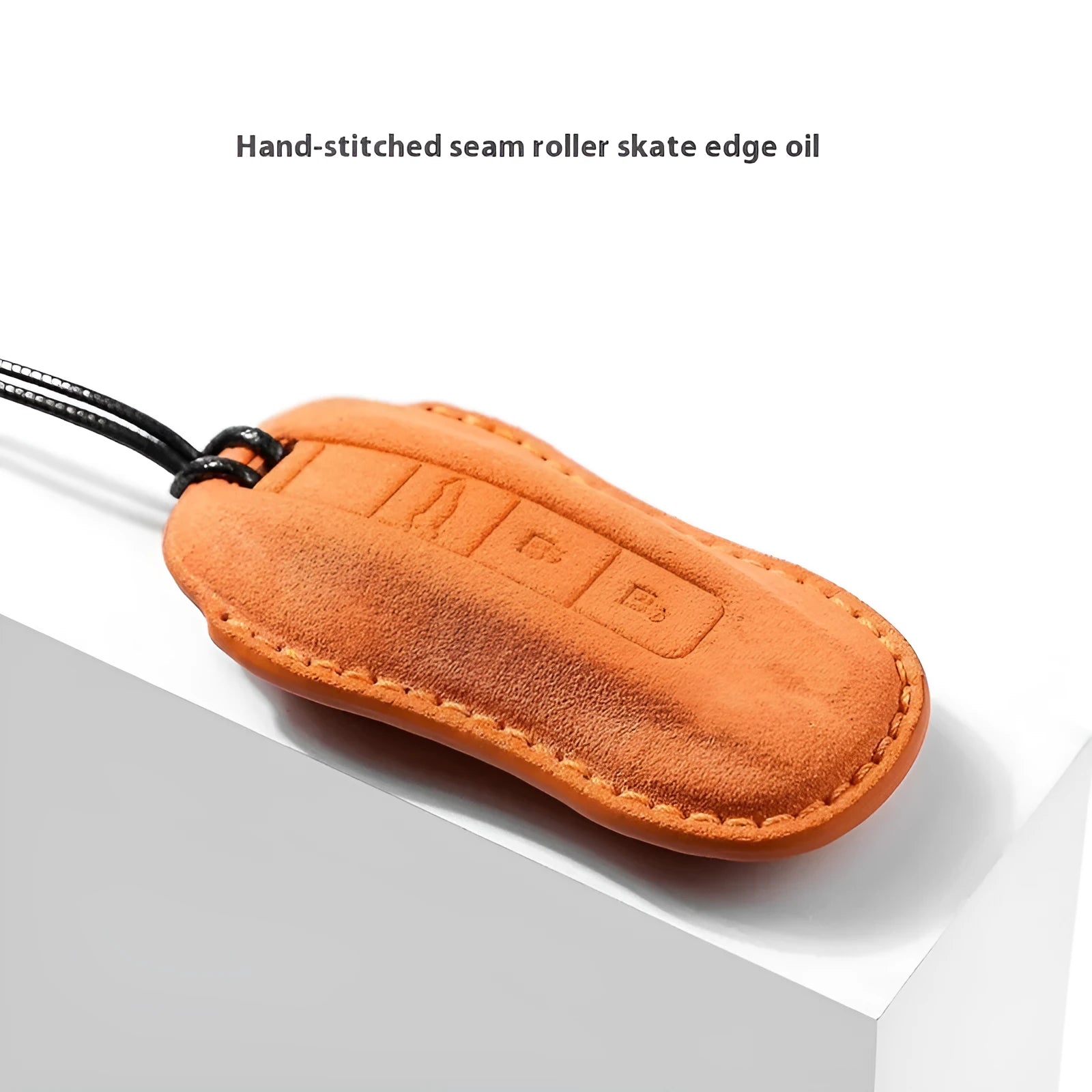 Suede car key cover shown in Cement Gray, Dark Green, Light Gray, and Orange colour options.