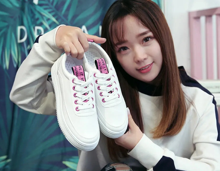 Women's breathable canvas sneaker in black, green, or pink with microfiber leather upper and rubber outsole
