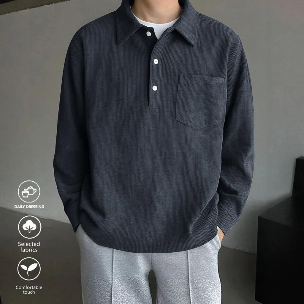 American retro casual bottoming shirt pullover in black, loose fit polyester fibre top on plain background.