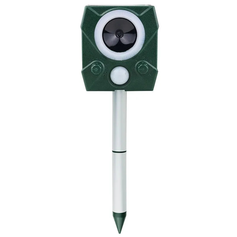 Ultrasonic solar bird repeller with ABS housing in outdoor garden setting