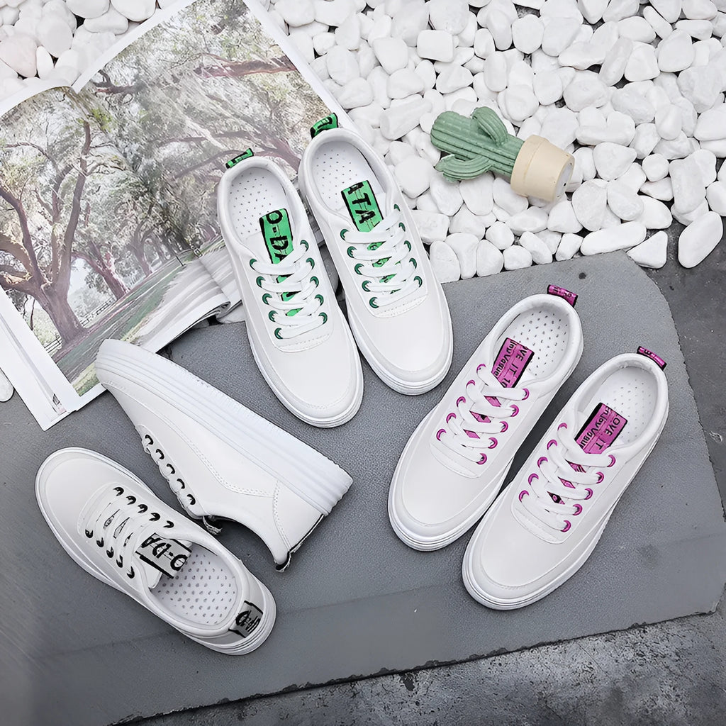 Women's breathable canvas sneaker in black, green, or pink with microfiber leather upper and rubber outsole
