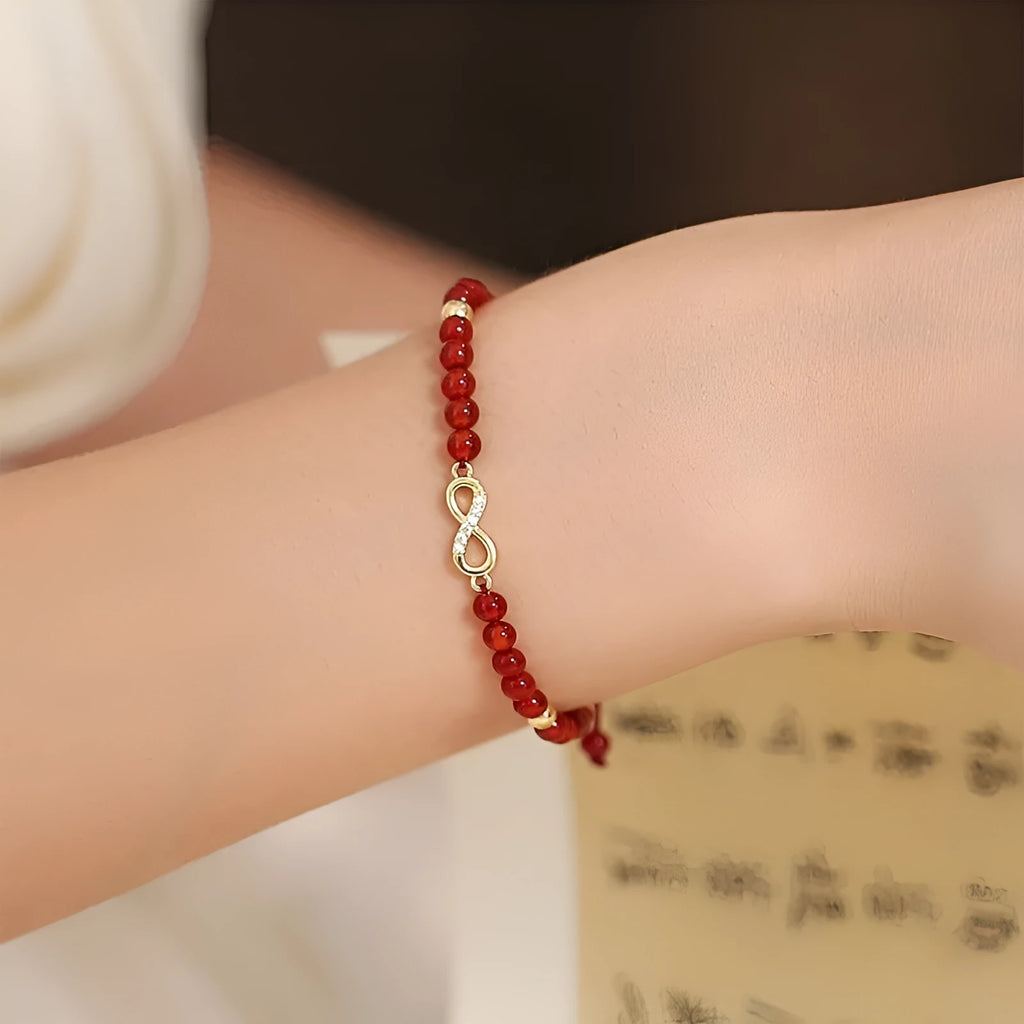 Hand-woven red agate bracelet with ethnic style design and diamond-shaped beads