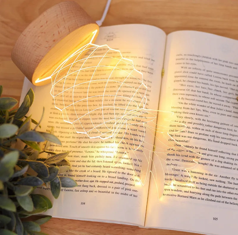 Cartoon pineapple-shaped night light with wooden base and acrylic shade on a table.