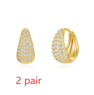 Brass diamond earclip earrings with electroplated gold finish and geometric round design