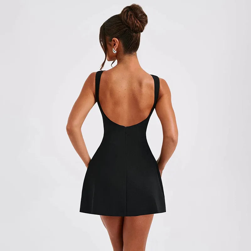 Slim-fitting black backless summer dress with sling-style straps and a high waist.