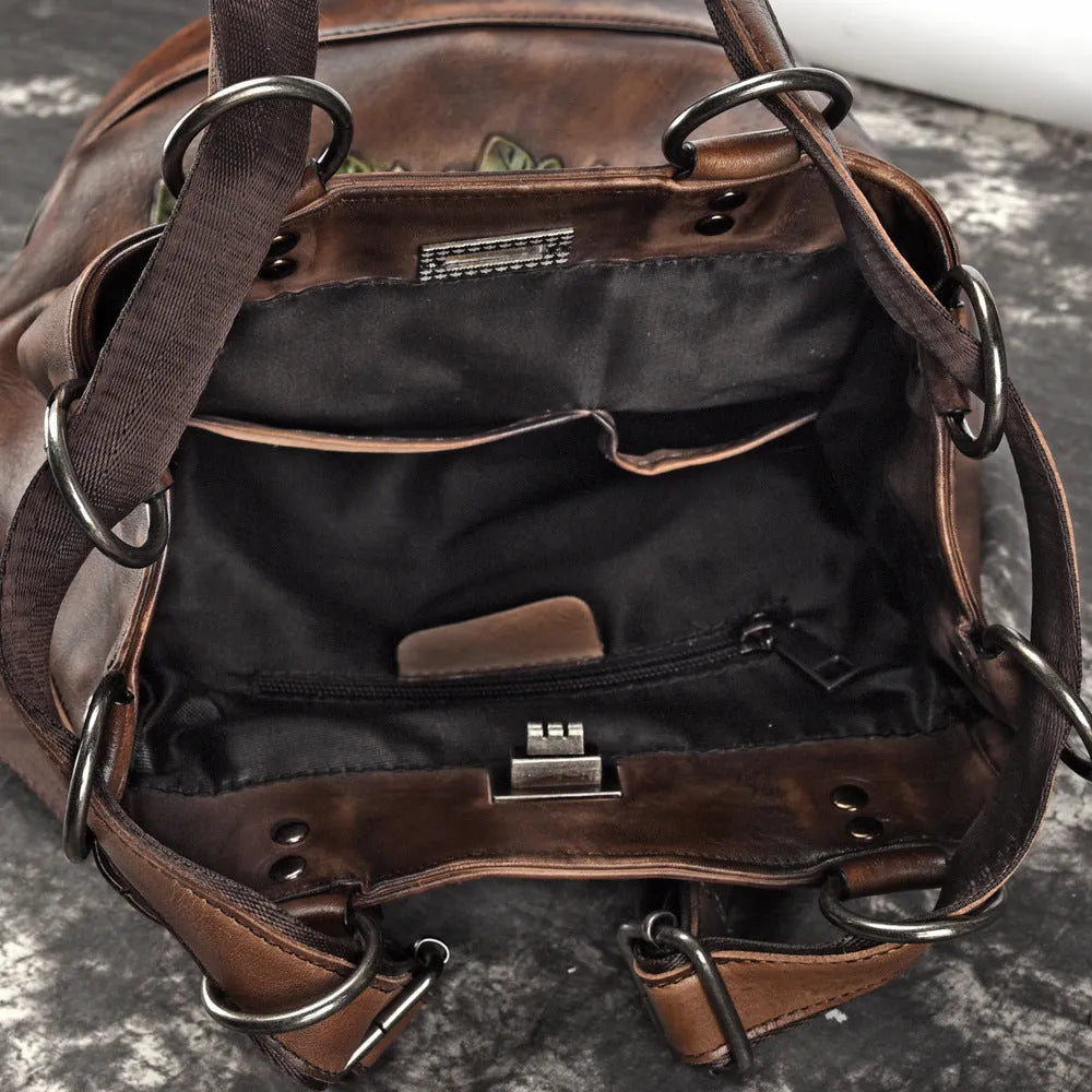 Women's retro leather bucket backpack in first layer cowhide, 25.5x30x15.5cm, with drawstring and double straps.