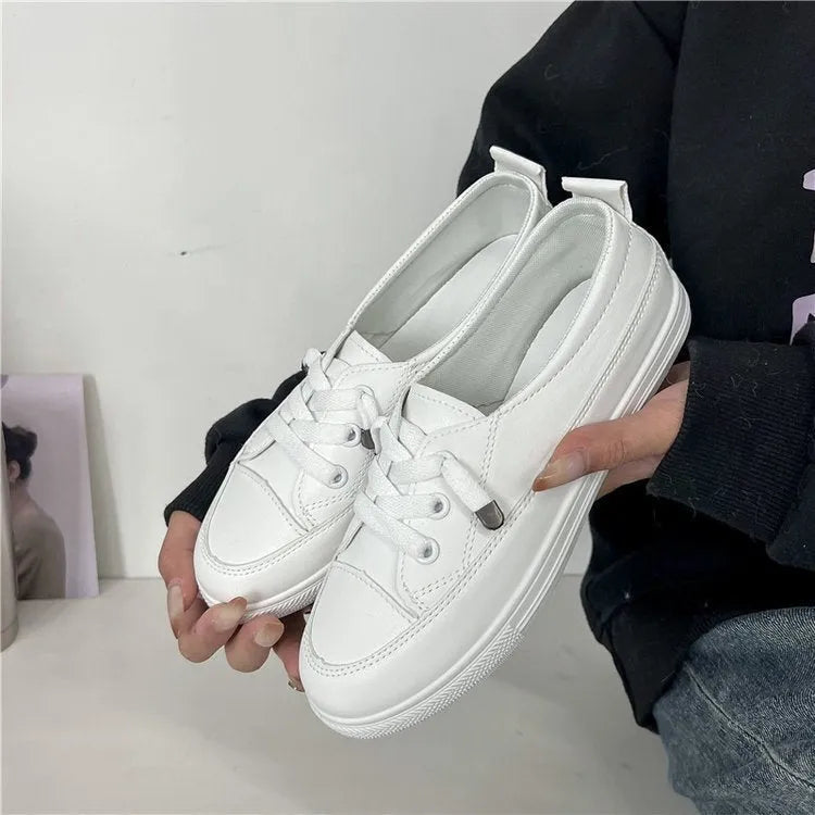 White women's sports shoes with flat heel, round toe, lace-up front, artificial PU upper, and rubber sole