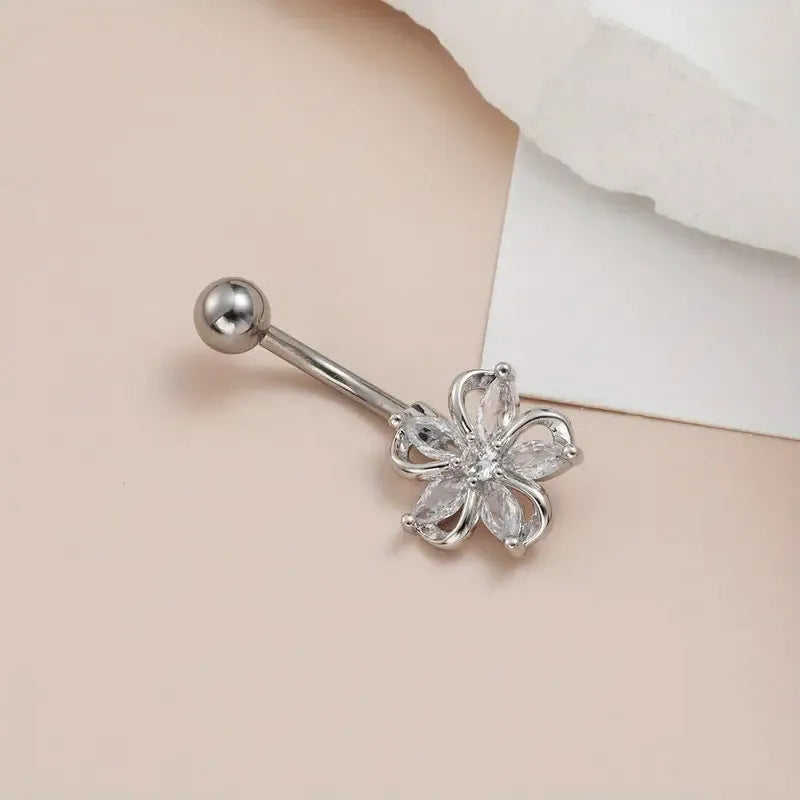 Copper navel stud with zircon flower design in electroplated gold finish
