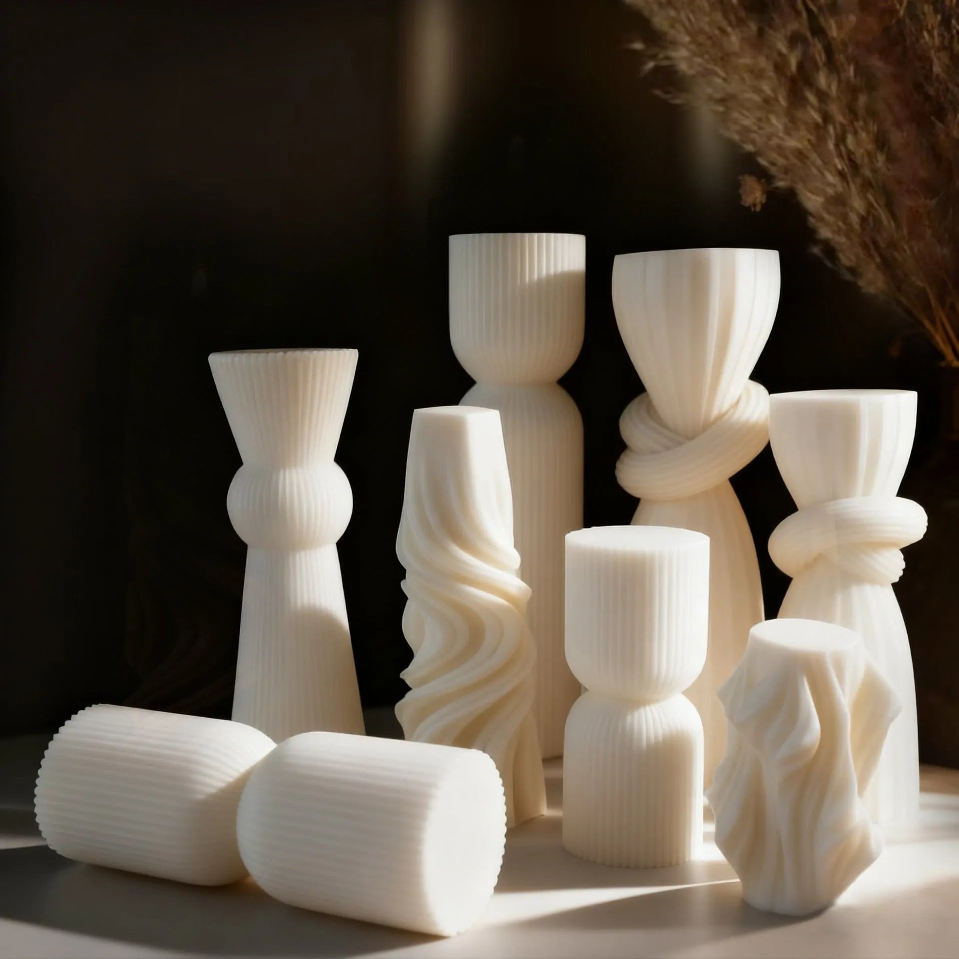 White cylindrical soy wax aromatherapy candle with geometric spherical shape on a table