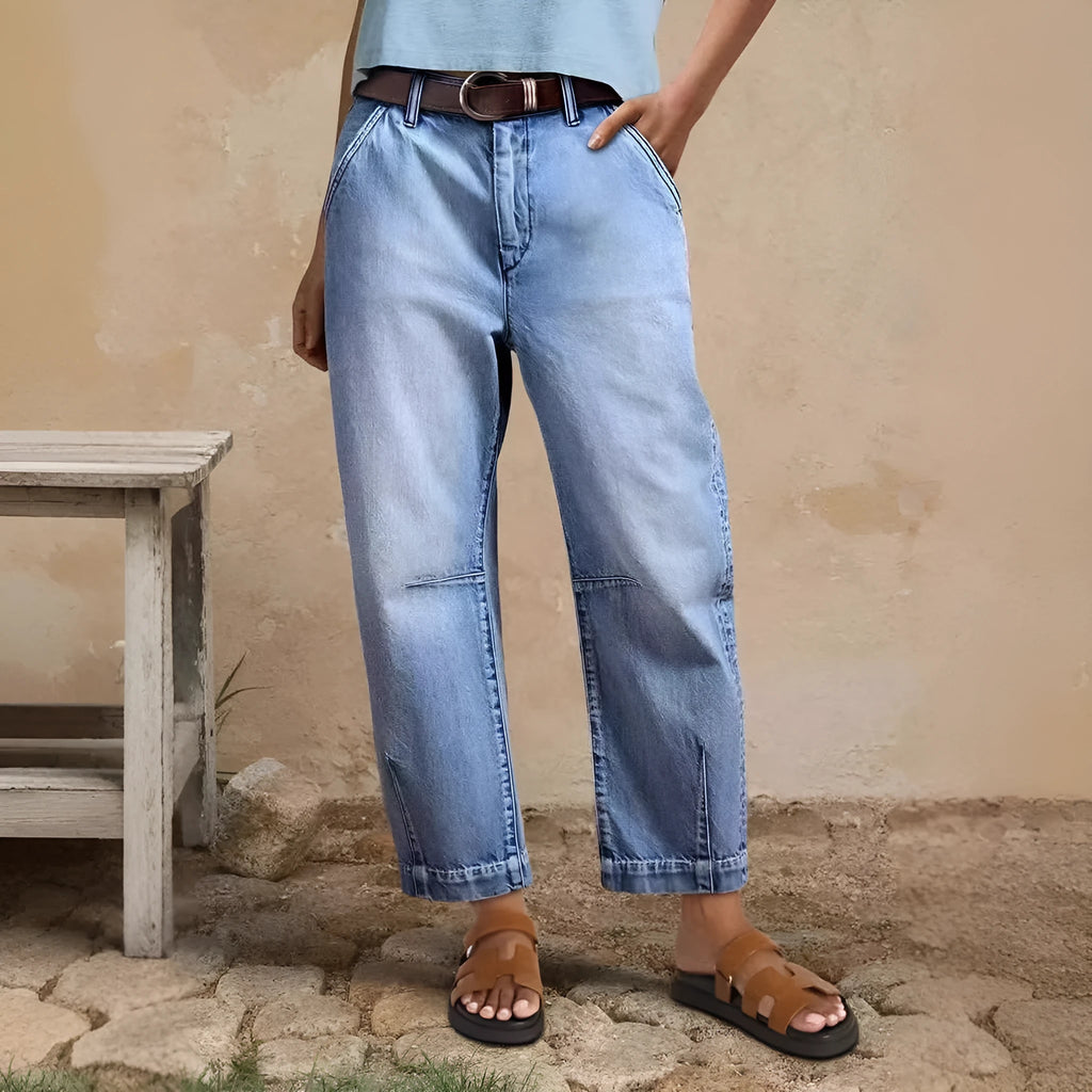 Casual cotton denim loose jeans trousers in light blue with washed finish, street hipster style