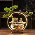 Ceramic flowing water lamp decoration in New Chinese Style with stone mill and lotus leaf design options for fish tank or tabletop use