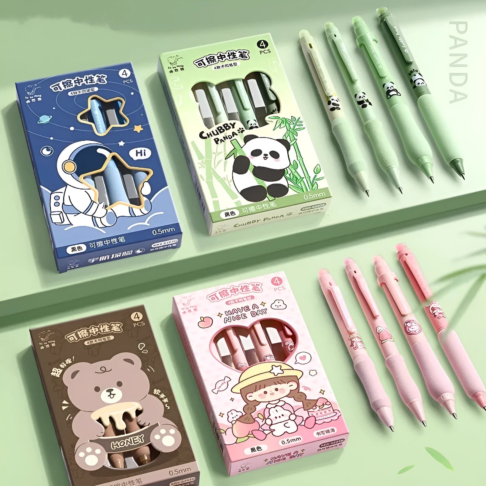 Erasable 0.5mm press gel pen with cartoon designs in black and crystal blue ink colours