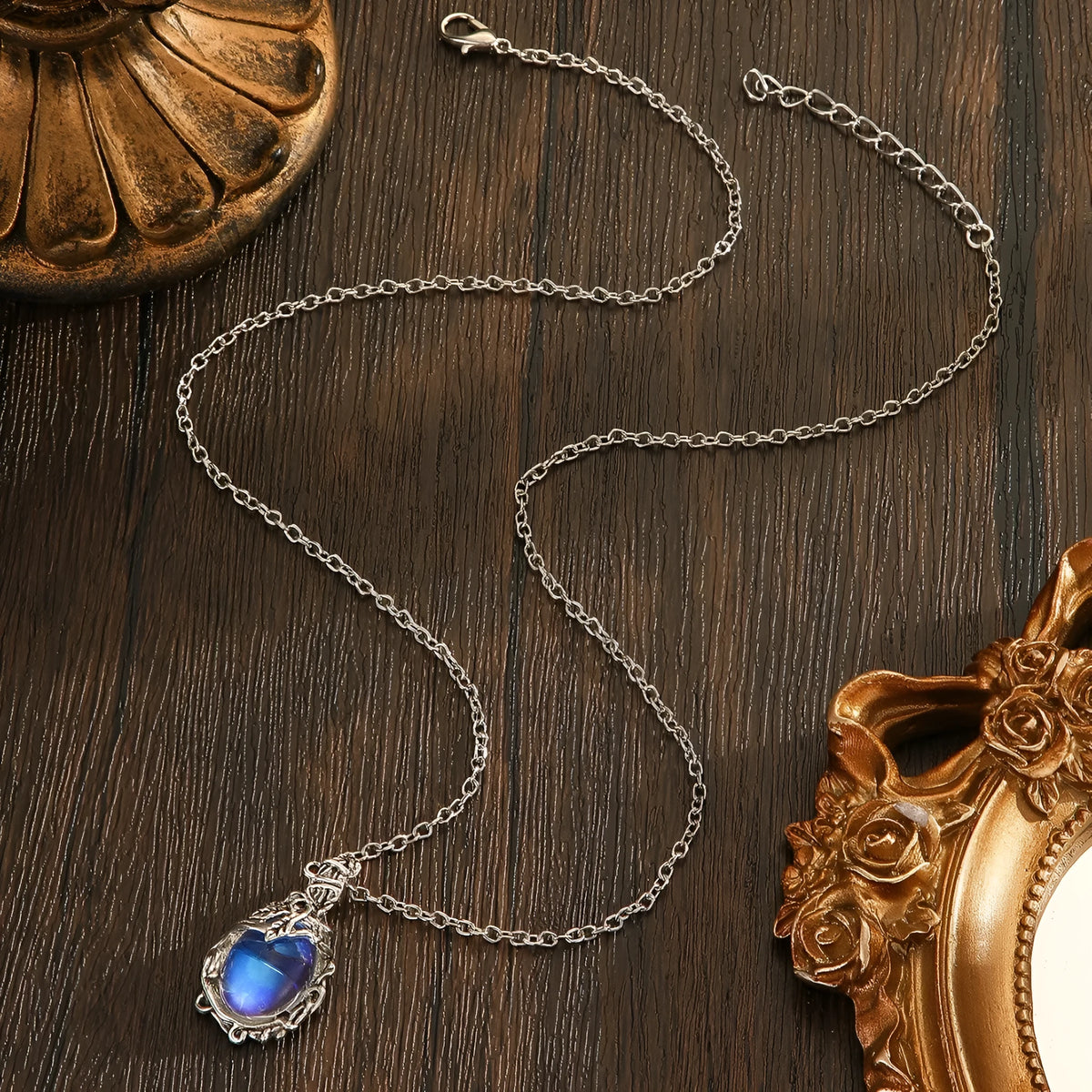 Moonstone necklace with oval cabochon pendant and silver-tone chain for weddings and everyday wear