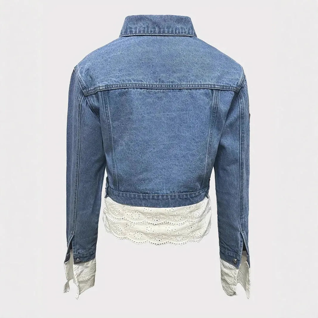 Blue women's denim jacket with white lace stitching on the front, long sleeves.