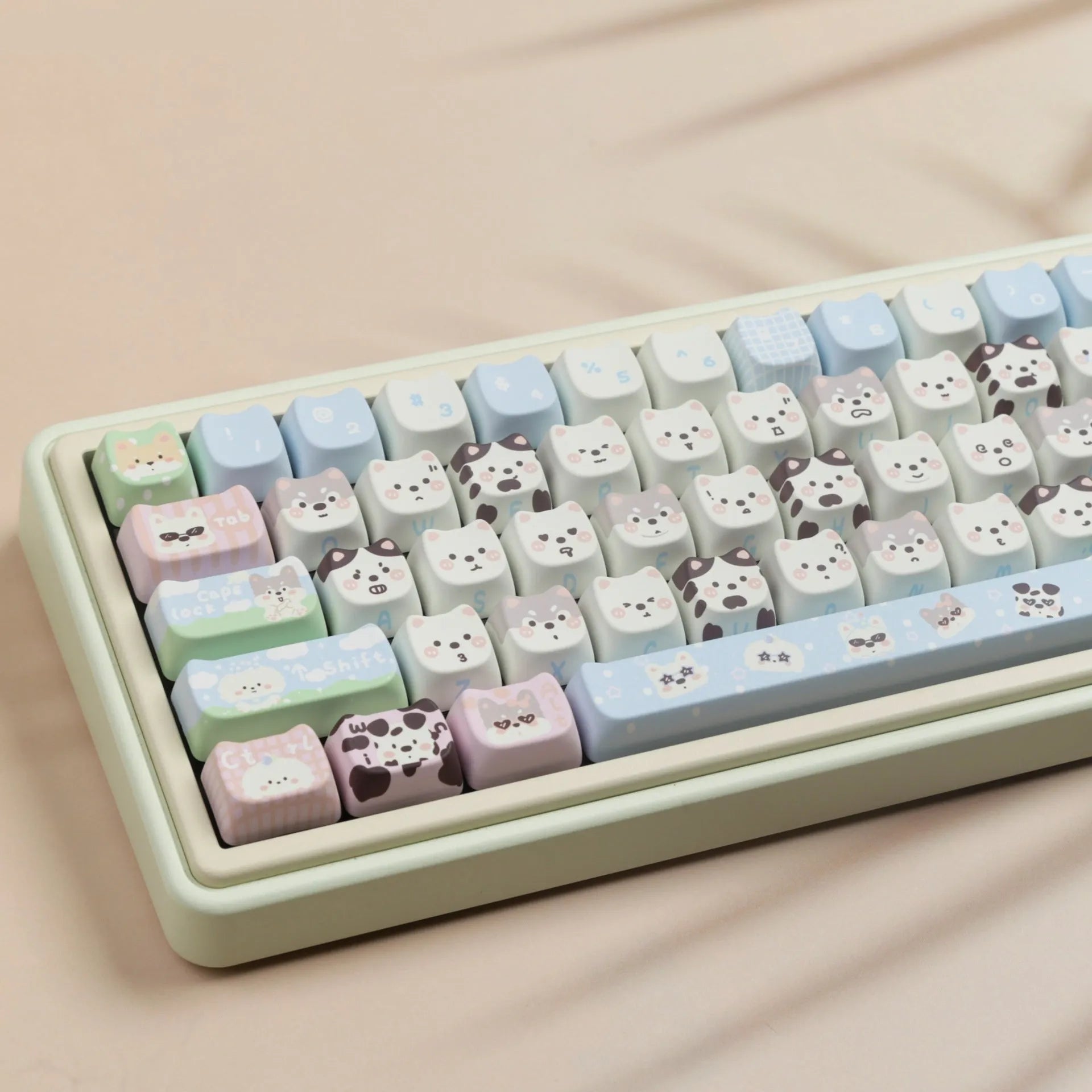 Colourful puppy character PBT key cap set for mechanical keyboards with 26 alphabetical characters.