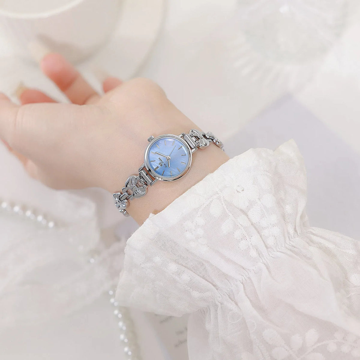 Women's French retro style watch with 7mm thin alloy case, shown in golden white, silver white, vintage gold and baby blue