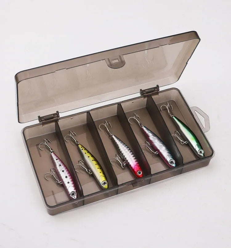 Set of five silver pencil bait fishing lures with double hooks in a storage box, showing four weight options