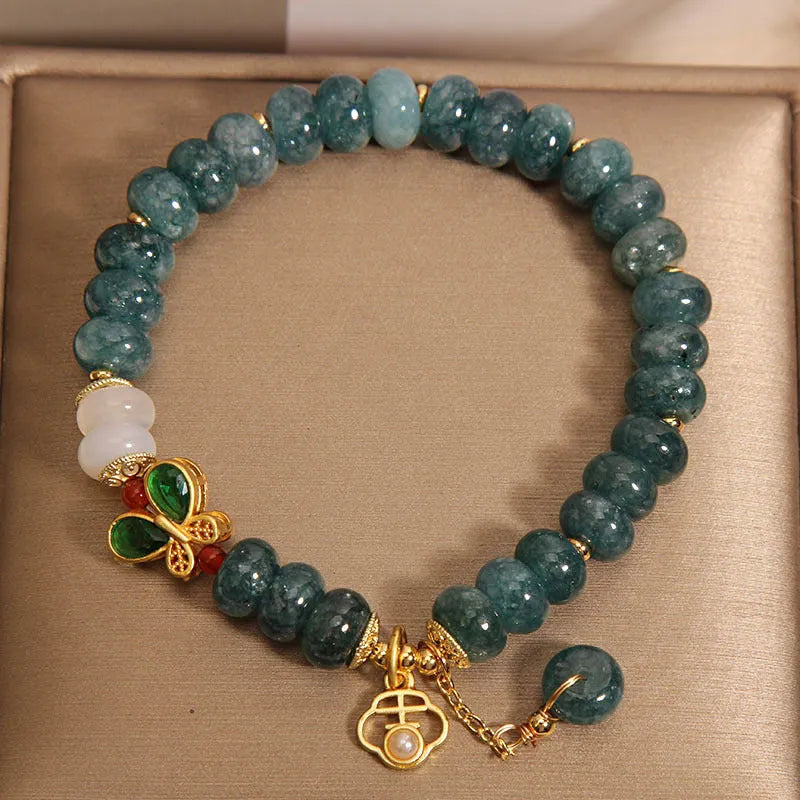 Blue water jade abacus beads crystal bracelet with butterfly clasp and white agate accents