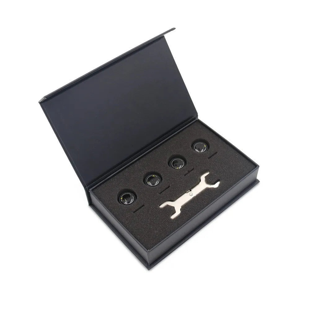 Bluetooth 5.0 automotive tyre pressure monitor kit with four black external sensors, a wrench, and anti-theft screws.