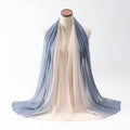 Long women's chiffon scarf with bubble towel texture draped to show its 175cm length and colour.