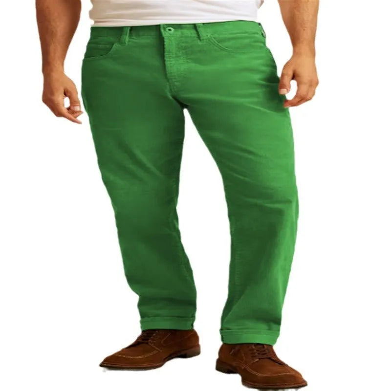 Loose fit solid colour corduroy casual trousers on a hanger showing straight leg and mid waist.