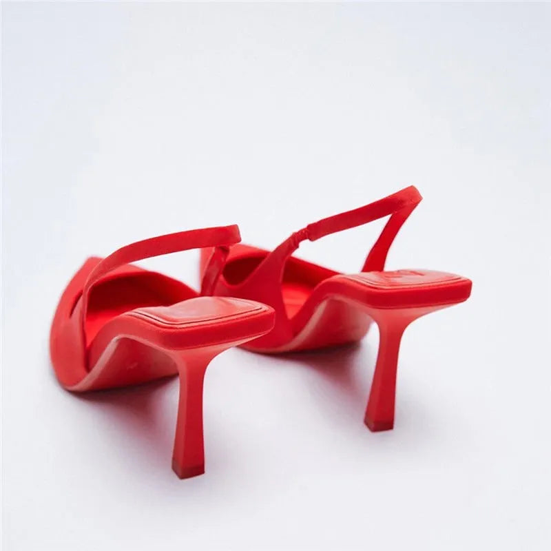 Thin heel pointed toe pumps for women in PU with rubber sole, available in red, green, black and purple, sizes 35-43
