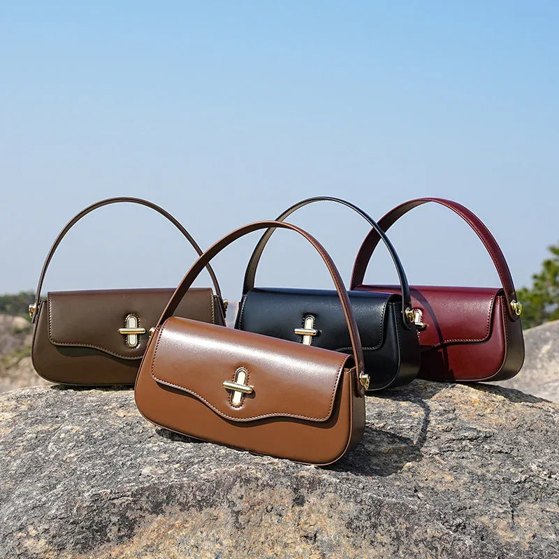 Moon baguette leather handbag in two-layer cowhide, 26 x 5.5 x 13 cm, clamshell shape, black wine red coffee caramel
