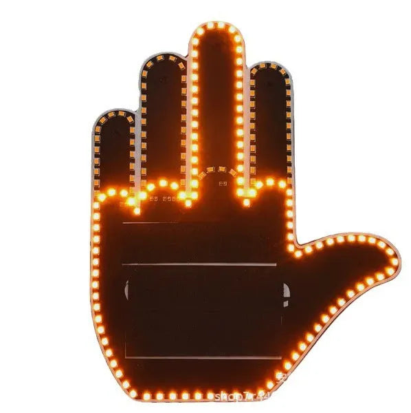Black plastic LED car gesture light showing middle finger gesture with remote control