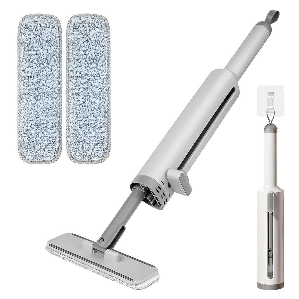 Rotatable self-squeeze mini mop with pink handle, crevice brush, and two microfiber pads on a tiled floor