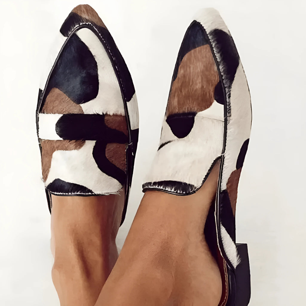 Women's black and white apricot animal print retro shoes with pointed toe and low heel.