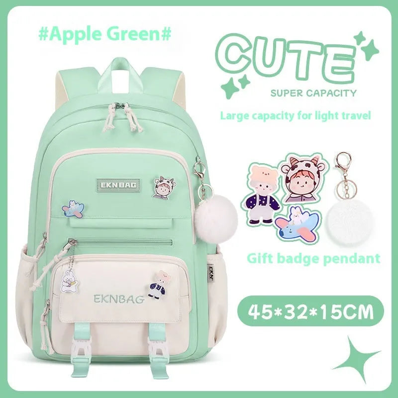 Waterproof pink Oxford cloth girls school backpack with curved straps on a white background.