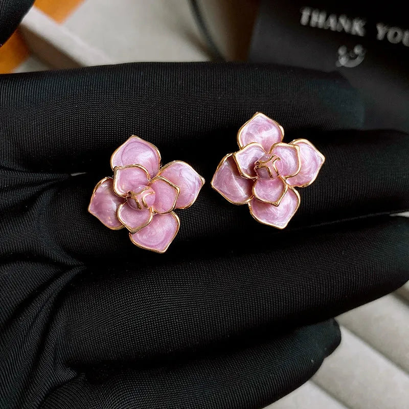 Golden-purple oil-spot glaze floral stud earrings with gold plating on copper base.