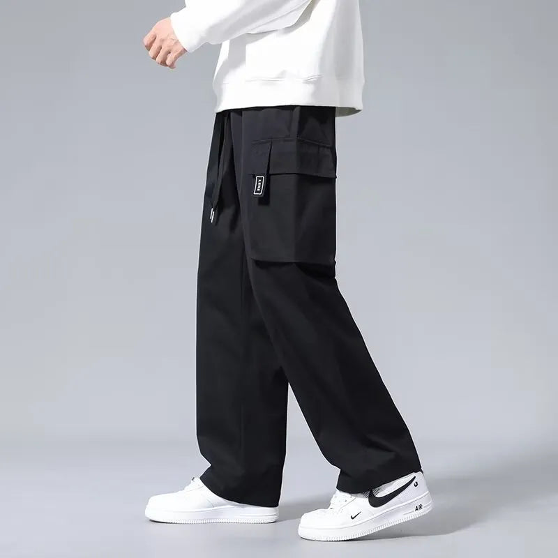 Boys straight leg cargo pants with drawstring waist and large pockets in Army Green