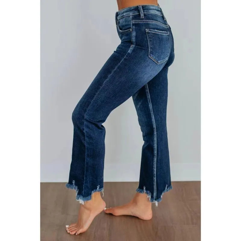 Women's solid colour cotton denim jeans with hand-worn detailing in dark blue and light blue.