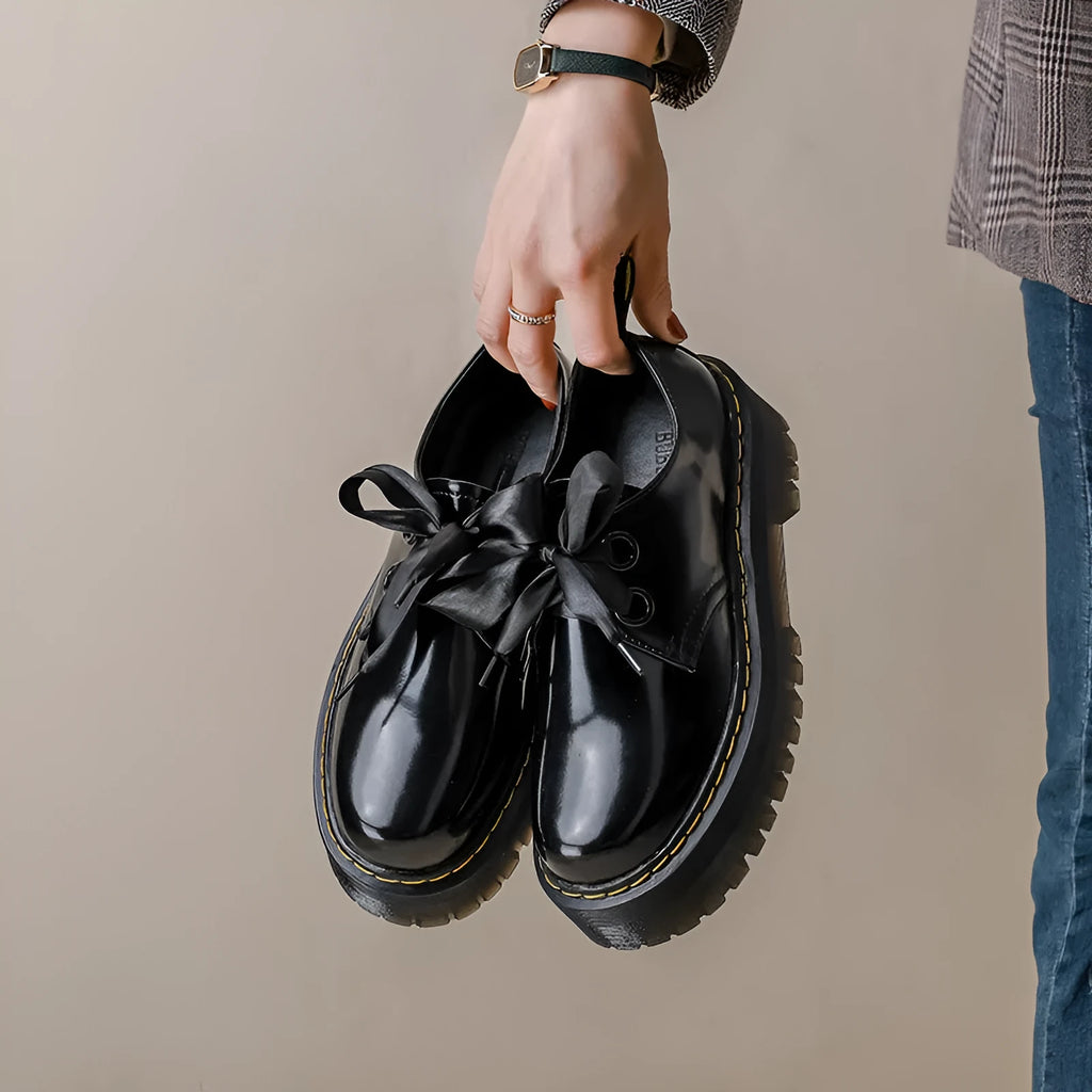 Women's black small leather shoes with thick TPR soles and cross strap design