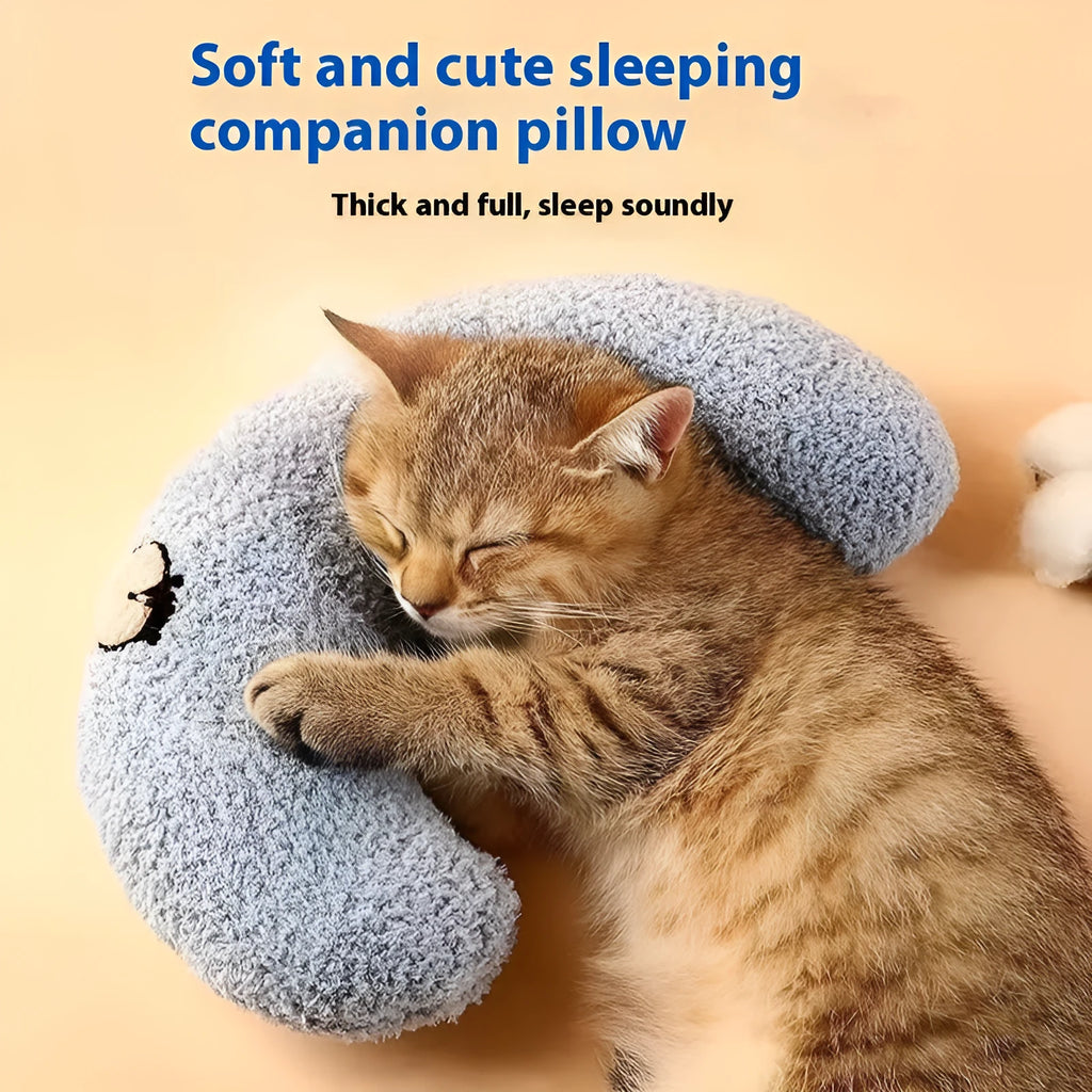 Blue U-shaped cat pillow with Moon design on a white background