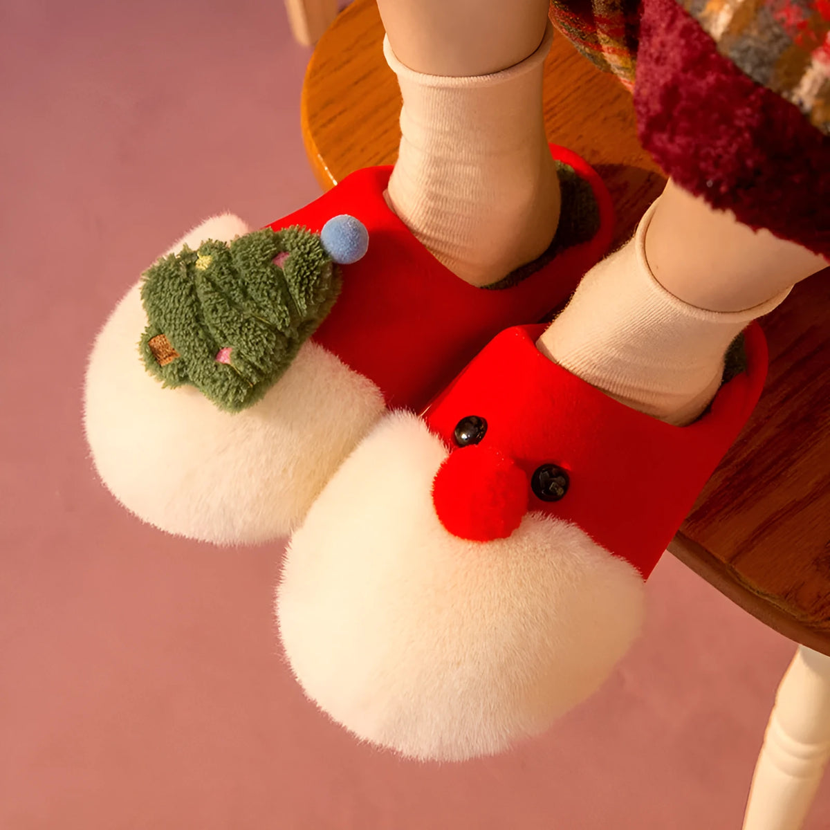 Christmas plush slippers for women with Santa Claus and Christmas tree design, warm non-slip house shoes in red, yellow, or blue.