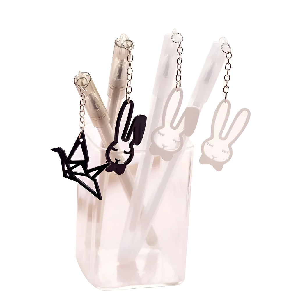 Plastic gel pen with decorative paper crane pendant and 0.38mm fine tip, shown at 17cm length.