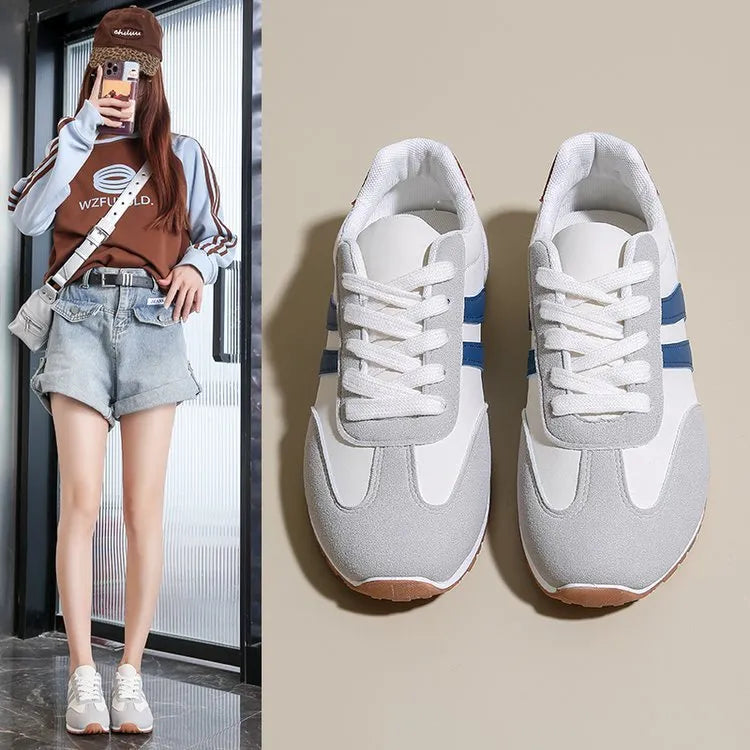 Blue and grey striped Cortez-style leisure sports shoes with a flat rubber sole.