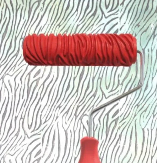 Red handled 7 inch texture paint embossing roller with rubber patterned sleeve for creating wall relief designs