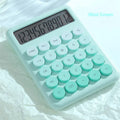 Gradient colour desktop calculator in ABS plastic showing violet, blue, green, and pink colour options