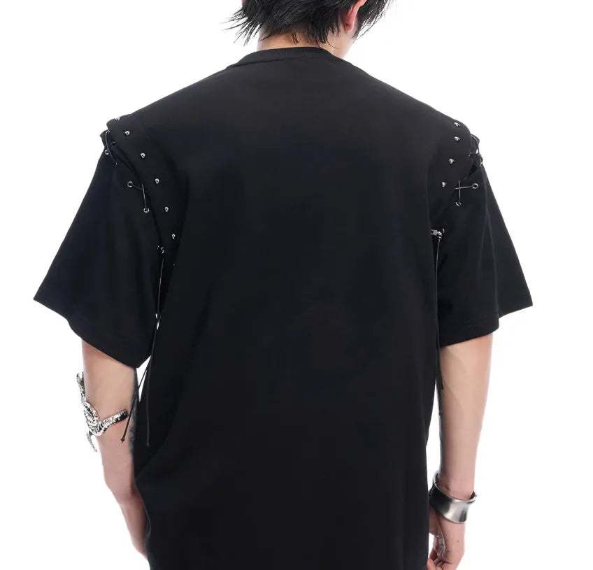 Women's black short sleeve t-shirt with lace-up detail and cutout design on front.
