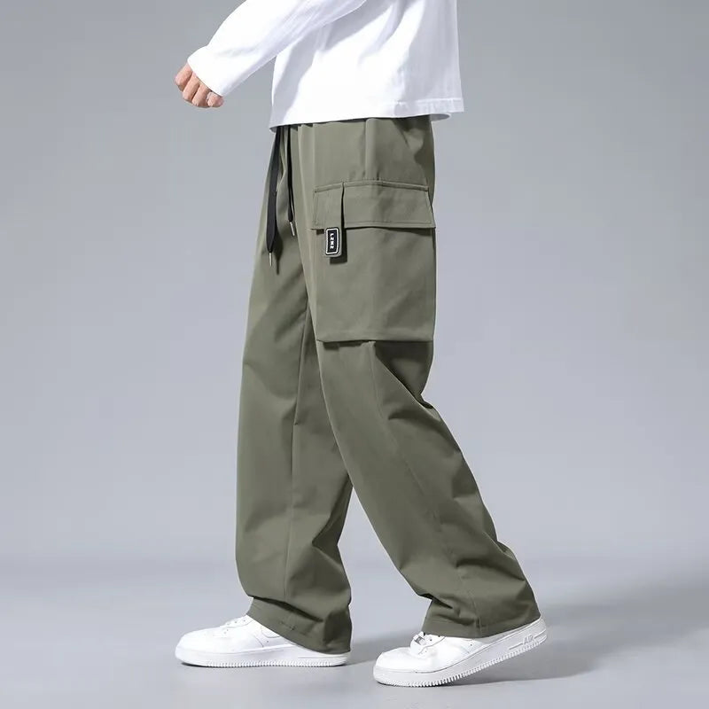Boys straight leg cargo pants with drawstring waist and large pockets in Army Green